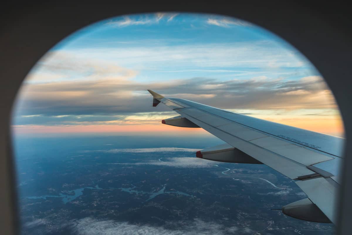 view outside airplane window of left wing