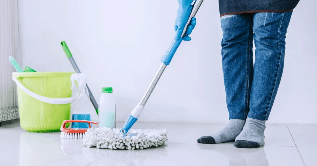 person mopping floor